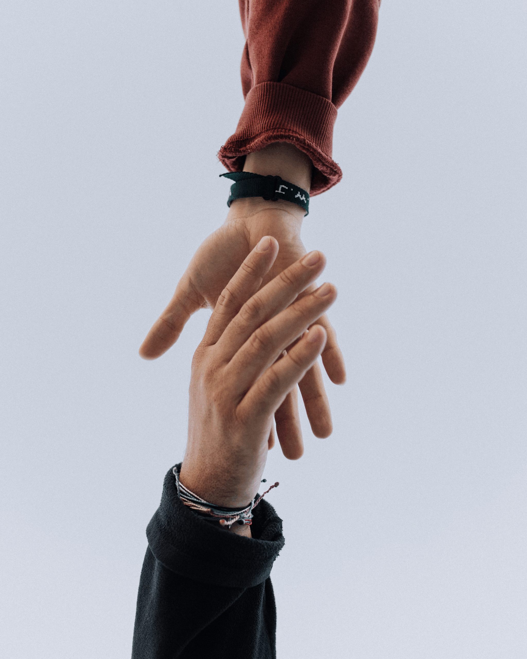 Hands reaching towards eachother